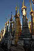 Inle Lake Myanmar. Indein, on the summit of a hill the  Shwe Inn Thein Paya a cluster of hundreds of ancient stupas. Many of them are ruined and overgrown with bushes.